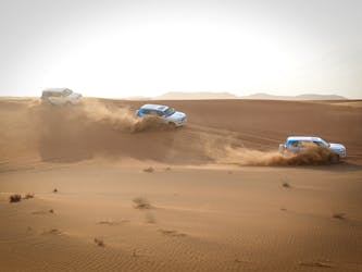 Safari matinal dans le désert d’Abu Dhabi avec balade à dos de chameau